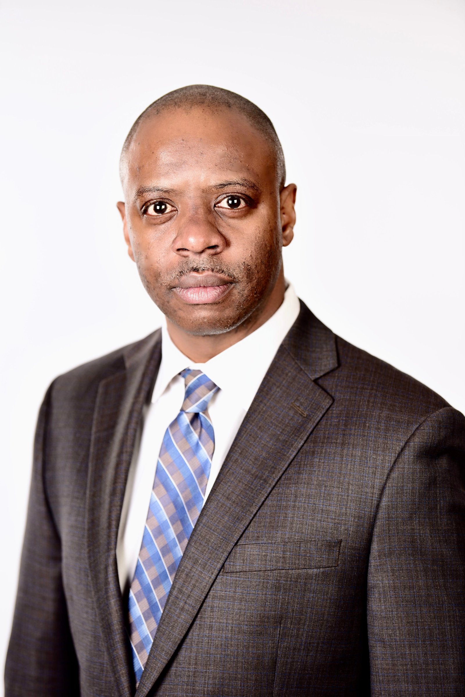 Portrait of Dr. Kenya Dugger, Managing Partner & Chief People & Culture Officer.